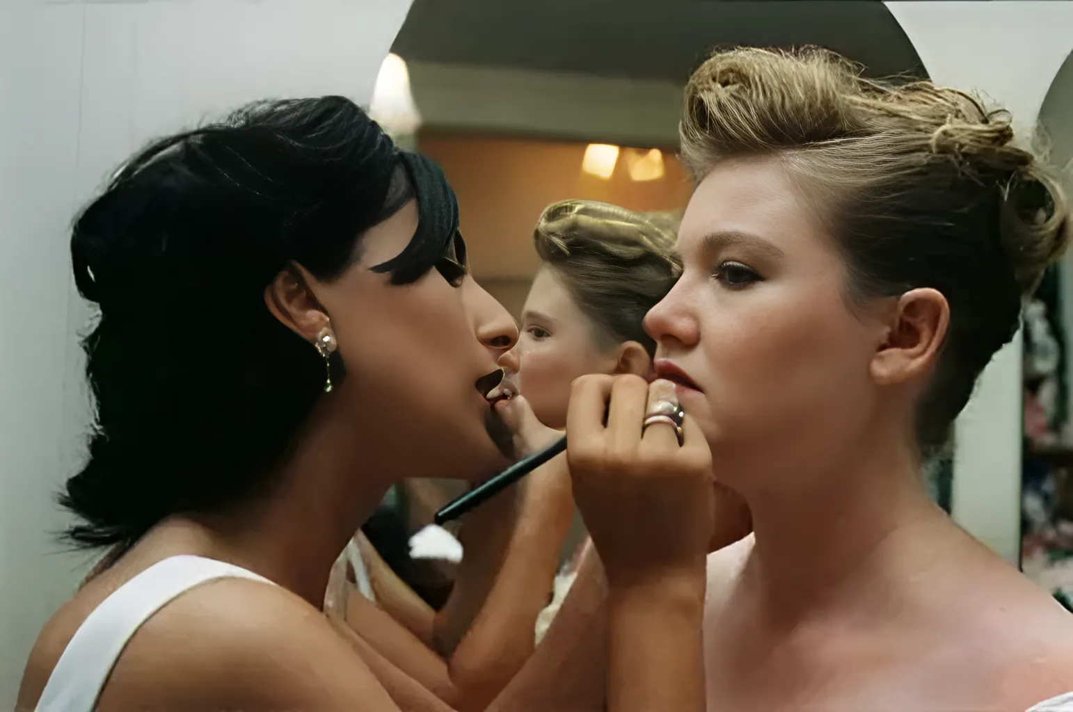 Admiring a glossy lipstick shade