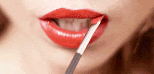 Removing red lipstick after safely completing the commute